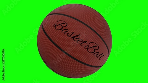 Basketball ball with the words basketball rotates on a green screen - chromakey background, loop. photo