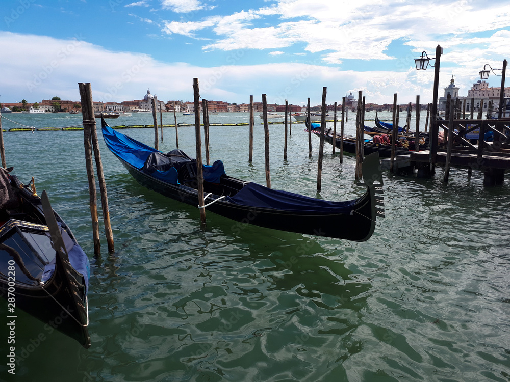 gondolas on the pier near Piazza San Marco gondolas on the pier near Piazza San Marco