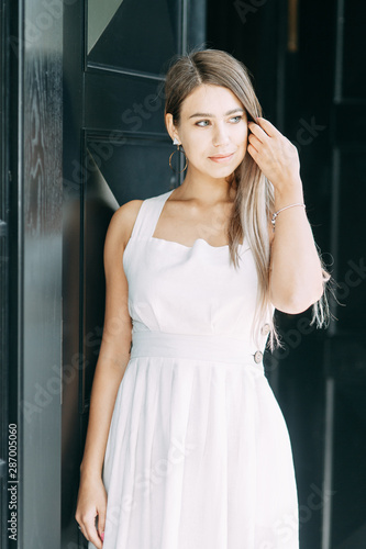 Light portraits of a woman in a restaurant. Beautiful girl blogger in the Park. © pavelvozmischev