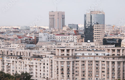 Cityscape of old part of Bucharest, with many worn out buildings, as seen from the Palace of Parliament