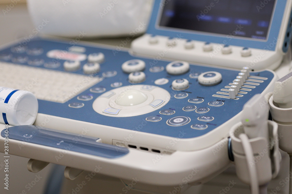 Details of a modern ultrasound machine inside a medic office Details of a modern ultrasound machine inside a medic office