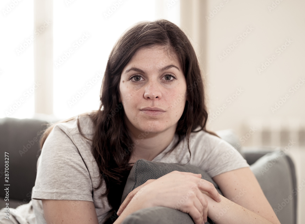 Beautiful lifestyle portrait of young woman happy and relaxed at home Beautiful lifestyle portrait of young woman happy and relaxed at home