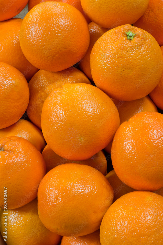 A group of oranges selling in a market A group of oranges selling in a market