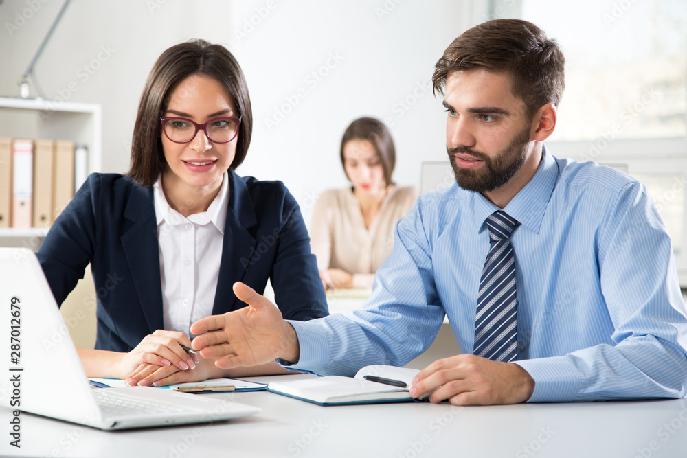Businessman tells his colleagues about a new project Businessman tells his colleagues about a new project