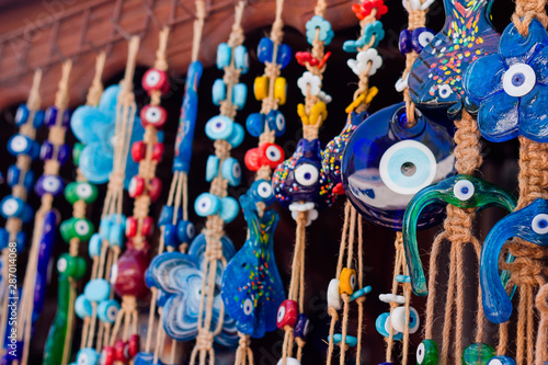 Multicolored nazar - evil eye amulets in store on the street