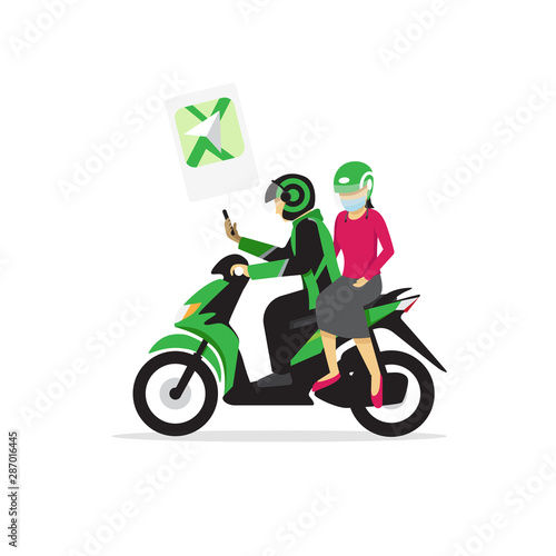 Man and Woman riding Green colored Motorcycle transportation in indonesia, its called ojek online