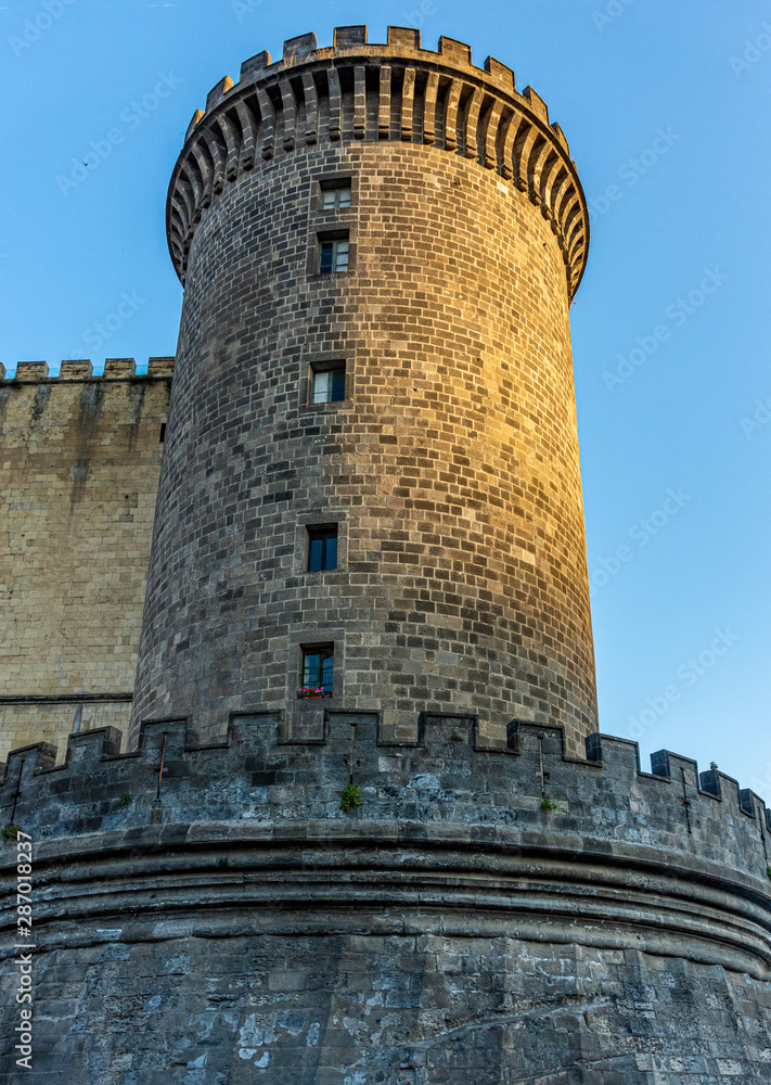 Italy, Naples, Maschio Angioino castle. Side tower.