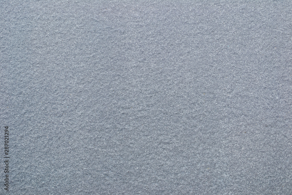 Grey matted granite texture background Grey matted granite texture background