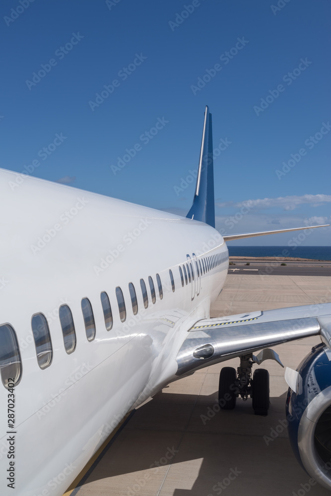 Fototapeta premium Aircraft on the steering track at the airport