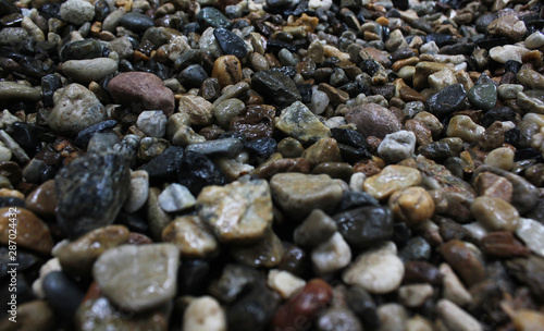 closeup​ rocks, stones​ it​ wet​ from​ the​ rain.​ rock​s​ background.​ stones​ background​ 