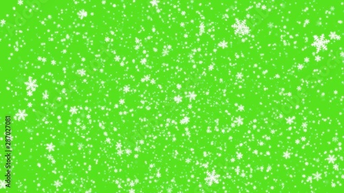 Isolated falling snow on green screen, Realistic Snow Falling in Front of Green Screen. Winter Creative Background