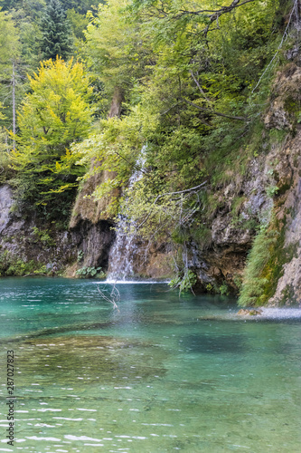 Fototapeta Naklejka Na Ścianę i Meble -  Waterfall in Plitvice national park, Croatia, lake with a blue water and waterfall - Image