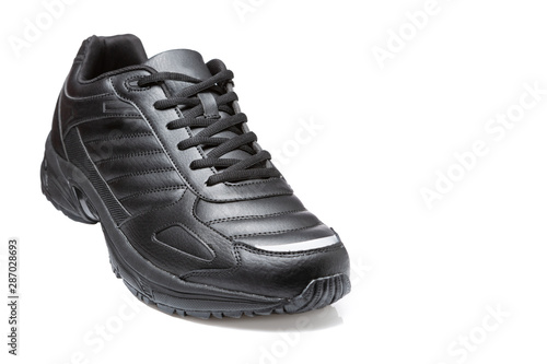 black leather sneaker, casual shoes, heel raised, on a white background