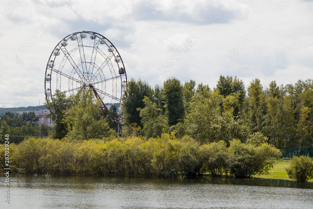 Ferris wheel in the city park.