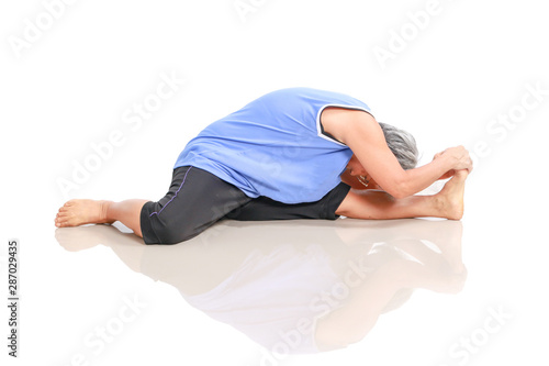 Healthy senior Asian women doing exercises, sport elderly lady practice yoga isolated on white background, Mature female warms up muscles, body flexibility and fitness lifestyle concept.