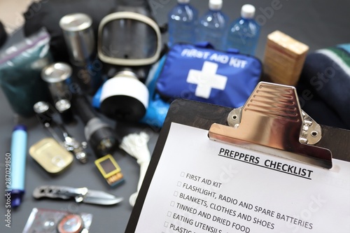 Clipboard checklist.Preppers are know for preparing for natural disasters,economic collapse,civil unrest or any doomsday scenario Such items would include food,water,lighting,shelter,and first aid kit