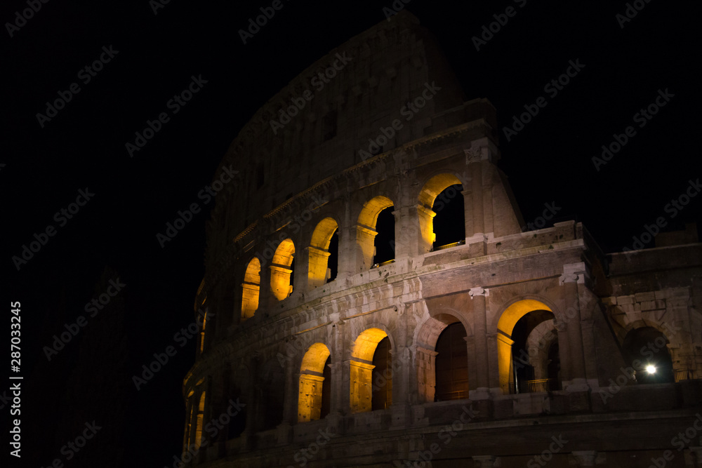 Colosseum night view, Rome landmark, Italy