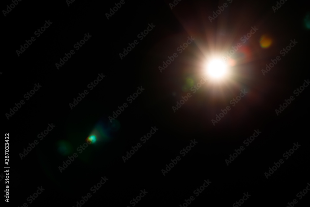 Abstract of sun with flare. Abstract of lighting digital lens fla. Abstract Festivevintage lights defocused. re in dark background Abstract of sun with flare. Abstract of lighting digital lens fla. Abstract Festivevintage lights defocused. re in dark background