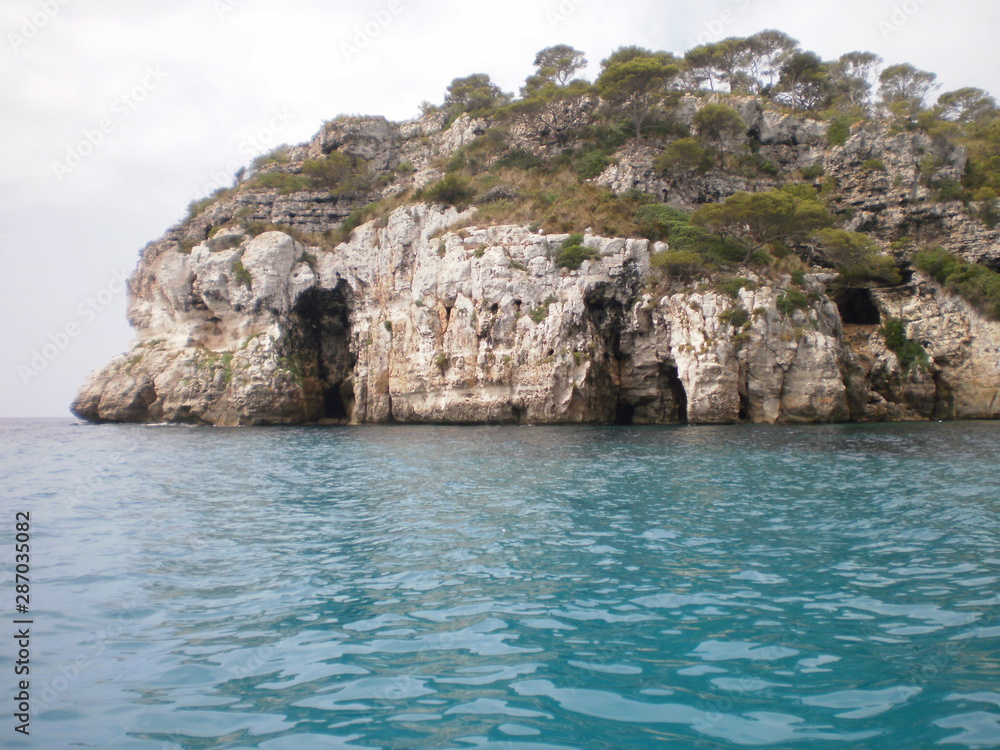 Wonderful Rock Formations Seen From A Boat In Citadel On Menorca Island. July 5, 2012. Menorca, Balearic Islands, Spain, Europe. Travel Tourism Street Photography