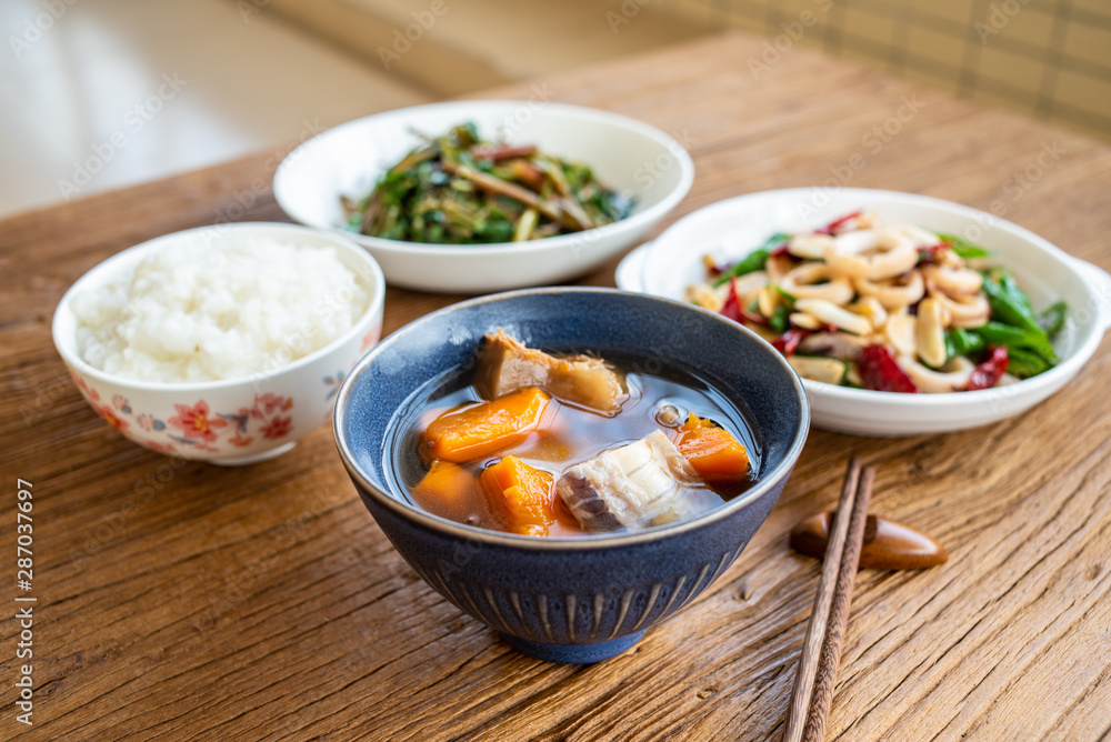 a table of national dishes on a wooden table a table of national dishes on a wooden table