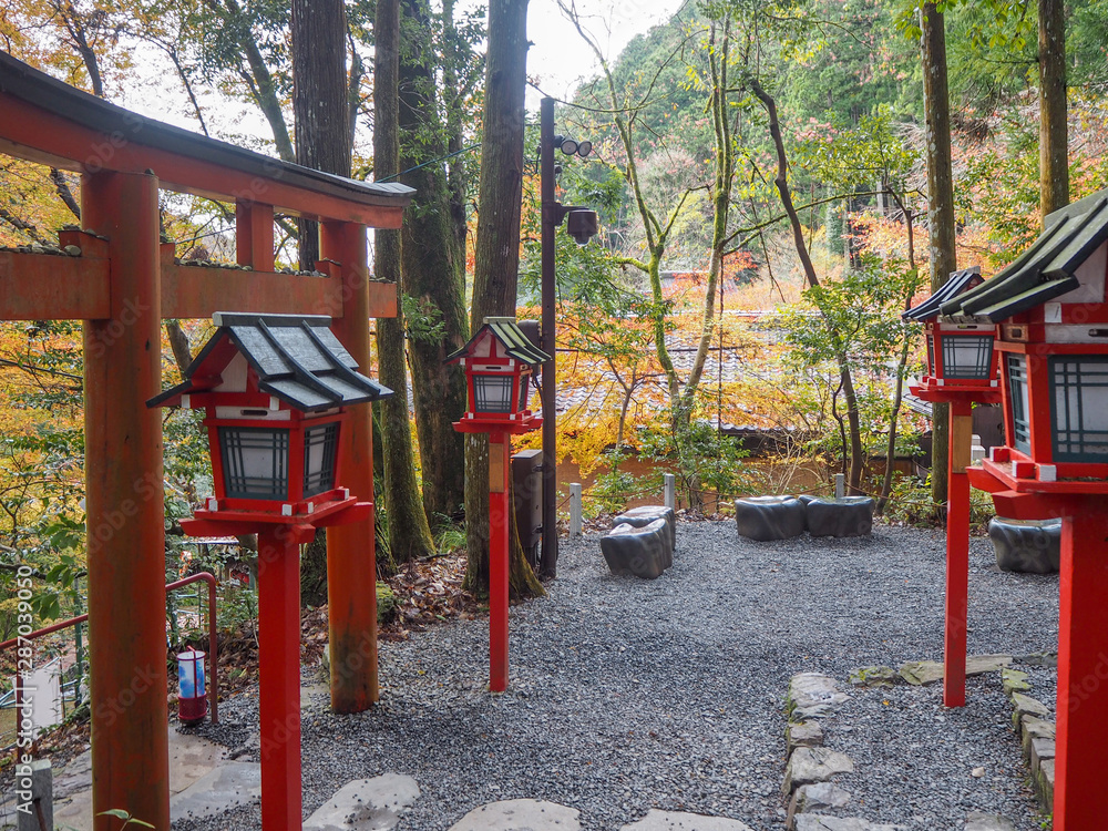 Japanese shinto shrine with colorful autumn trees on mountain in rural area of Kyoto, Japan Japanese shinto shrine with colorful autumn trees on mountain in rural area of Kyoto, Japan
