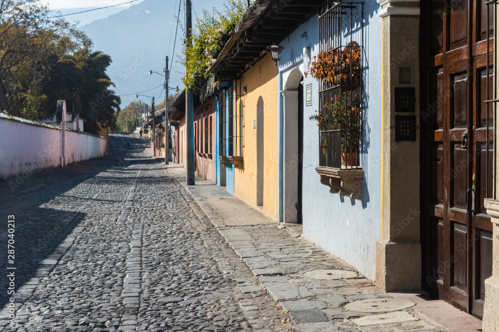 Fototapeta premium ANTIGUA, SACATEPEQUEZ/GUATEMALA - December 23, 2018: A scene in the UNESCO World Heritage site of Antigua, Guatemala, on a Sunday before Christmas Day 2018.
