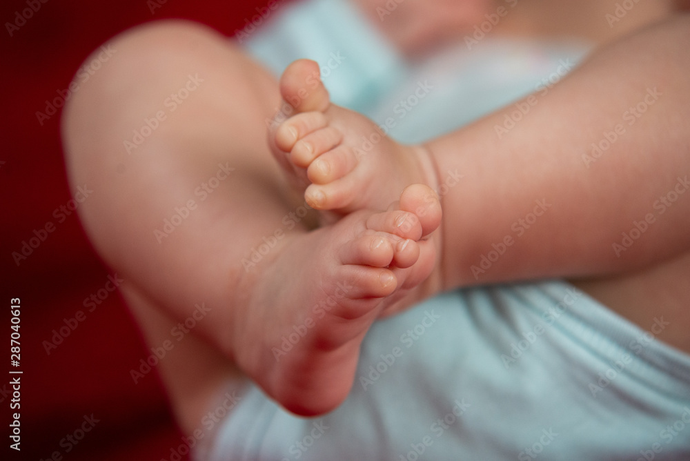 closeup on the feet of a newborn baby closeup on the feet of a newborn baby