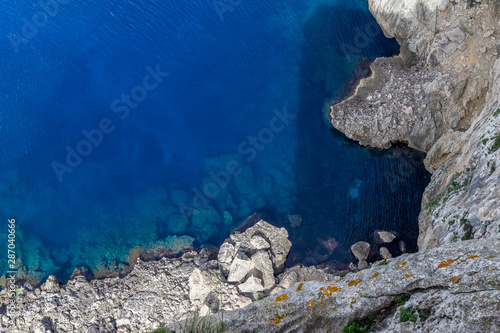 Scenic view at the coastline of Formentor, Punto de la Salada on balearic island Mallorca, Spain with clear blue and turquoise water and rock formation