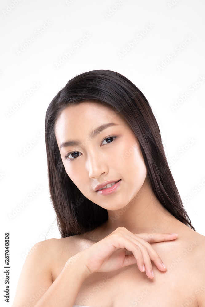 Beautiful Young Asian Woman Looking While Touching Shoulder feeling so happy and cheerful with healthy Clean and Fresh skin,isolated on white background,Beauty Cosmetology Concept Beautiful Young Asian Woman Looking While Touching Shoulder feeling so happy and cheerful with healthy Clean and Fresh skin,isolated on white background,Beauty Cosmetology Concept