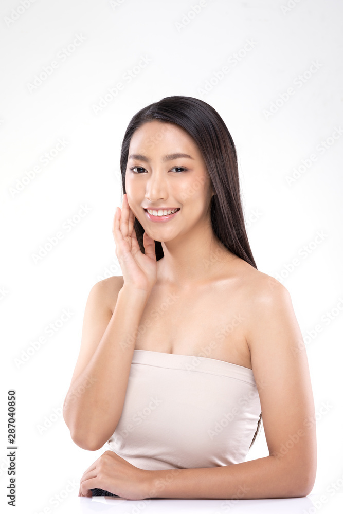 Beautiful Asian woman touching soft cheek smile with clean and fresh skin Happiness and cheerful with positive emotional,isolated on white background,Beauty and Cosmetics Concept Beautiful Asian woman touching soft cheek smile with clean and fresh skin Happiness and cheerful with positive emotional,isolated on white background,Beauty and Cosmetics Concept