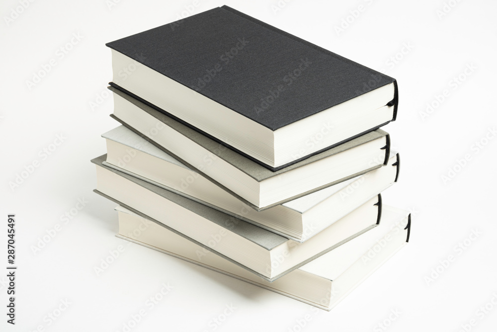 A Disarrayed Stack OF Cloth Bound Books A Disarrayed Stack OF Cloth Bound Books