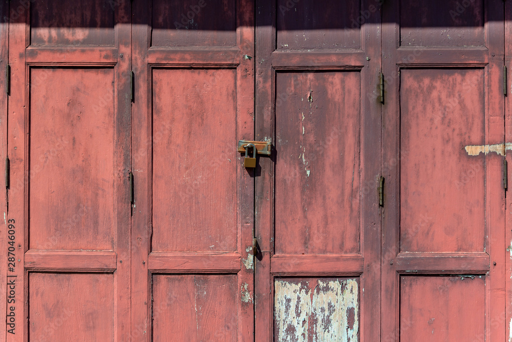 Red wood door,close and lock by key Red wood door,close and lock by key