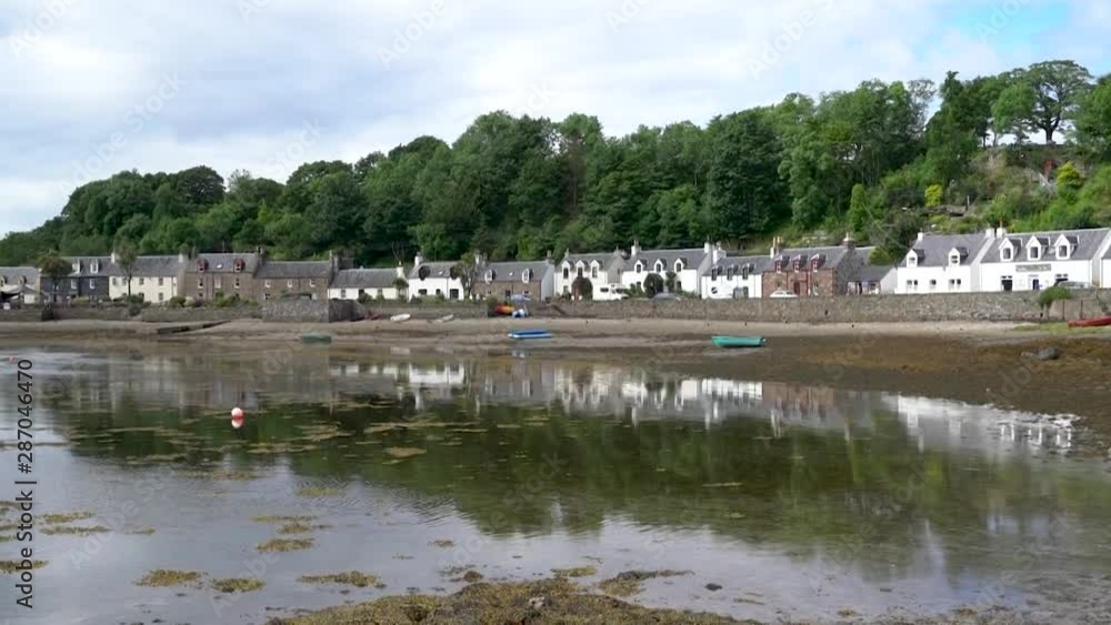 Idyllic view of Plockton, village in the Highlands of Scotland in the county of Ross and Cromarty. Idyllic view of Plockton, village in the Highlands of Scotland in the county of Ross and Cromarty.