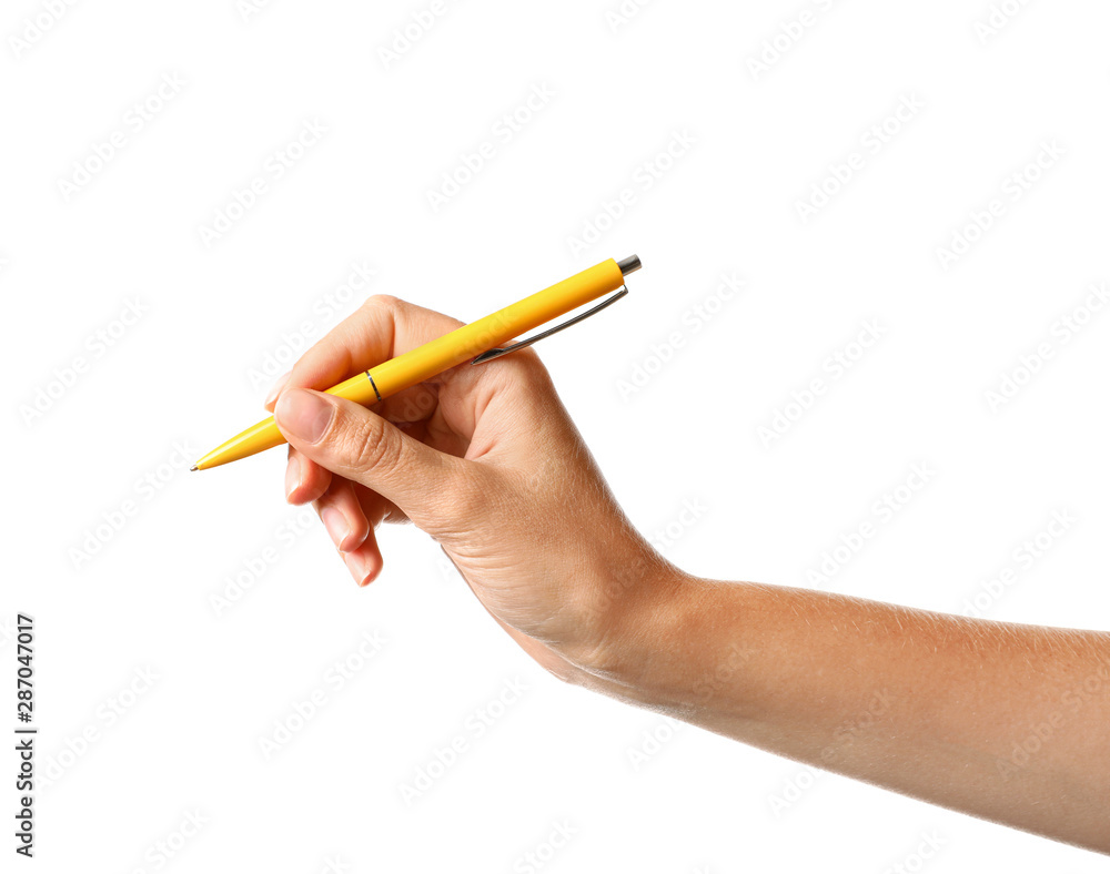 Young woman holding pen on white background, closeup Young woman holding pen on white background, closeup
