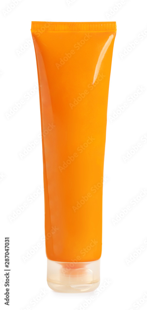 Orange tube with sun protection body cream on white background. Cosmetic product Orange tube with sun protection body cream on white background. Cosmetic product