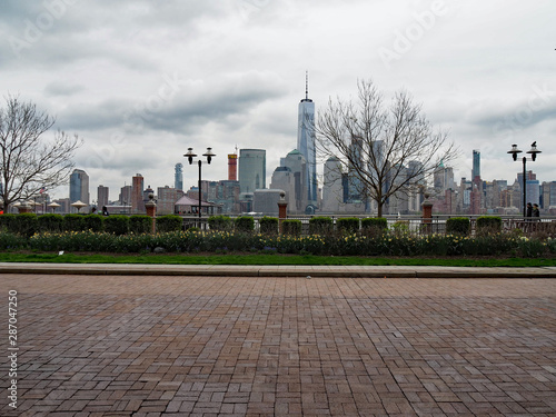 USA, NEW YORK - April 22, 2017 New York City view from New Jersey, some people walking