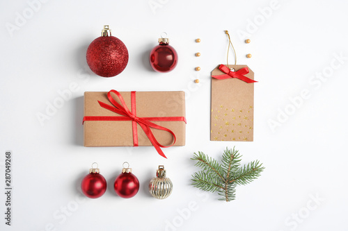 Fir tree branch with Christmas decoration on white background  top view