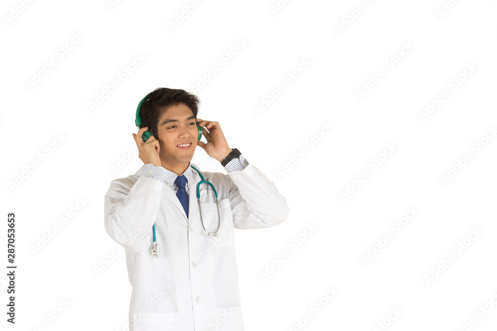 A young Asian doctor with a stethoscope Putting green music headphones to relax on the white background A young Asian doctor with a stethoscope Putting green music headphones to relax on the white background