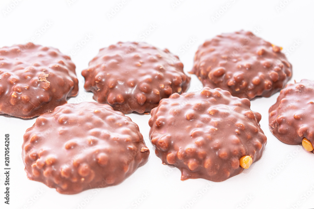 Six сookies with chocolate icing on white background, top view, isolated Six сookies with chocolate icing on white background, top view, isolated