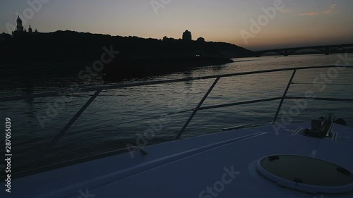 Yacht. The yacht floats on the river at night. photo