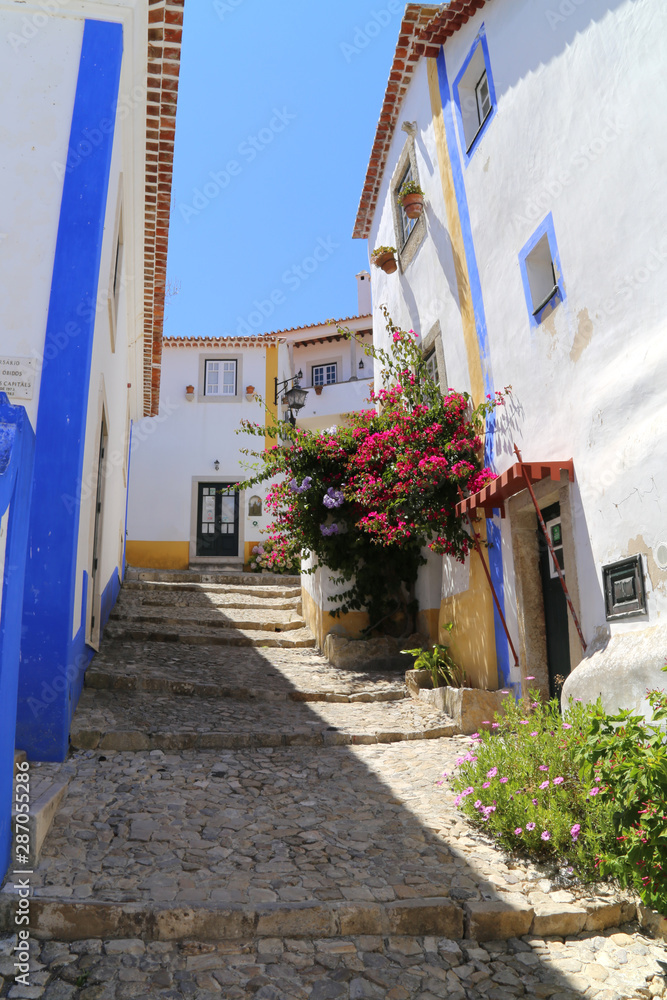 Fototapeta premium Small alleys in historic town Óbidos, Portugal