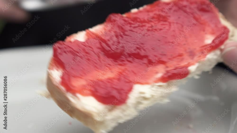 Lockdown: Removing Remaining Jam on the Knife by Spreading on the Bread - Smaland, Sweden Lockdown: Removing Remaining Jam on the Knife by Spreading on the Bread - Smaland, Sweden
