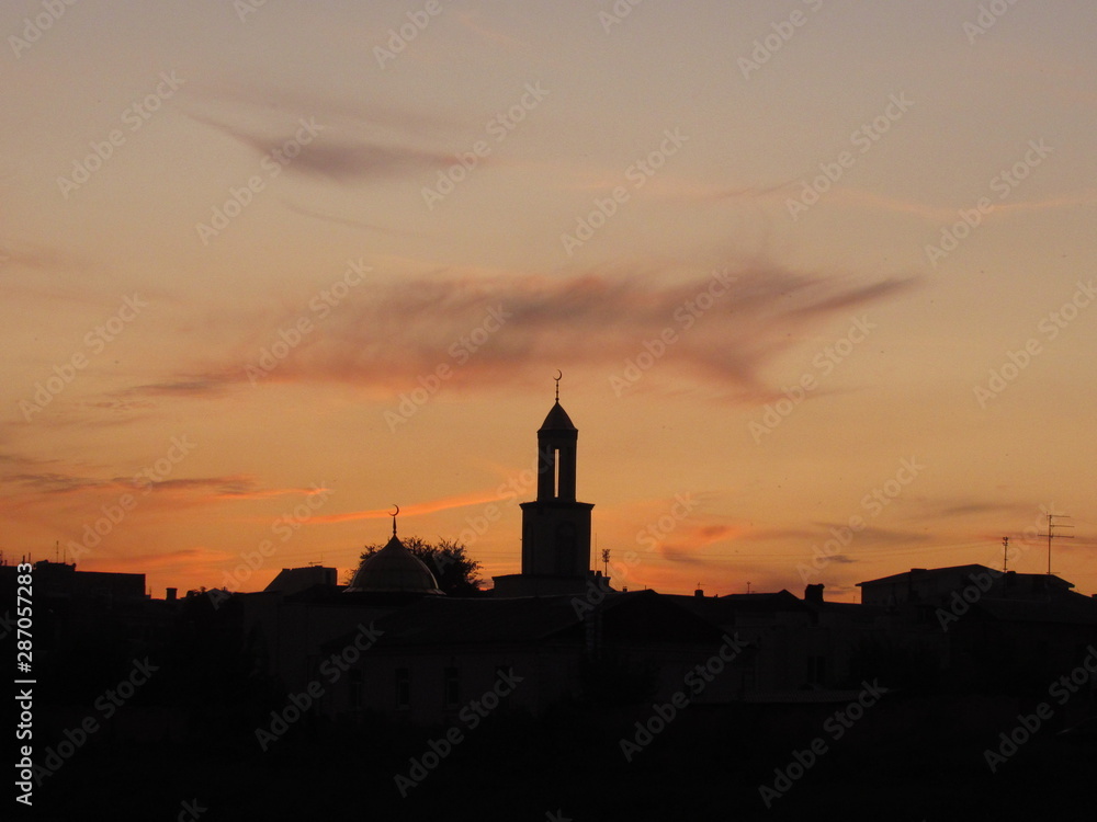 sunset over mosque