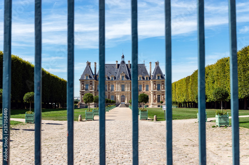 View of the Chateau de Sceaux through the entrance gate - Hauts-de-Seine, France. photo