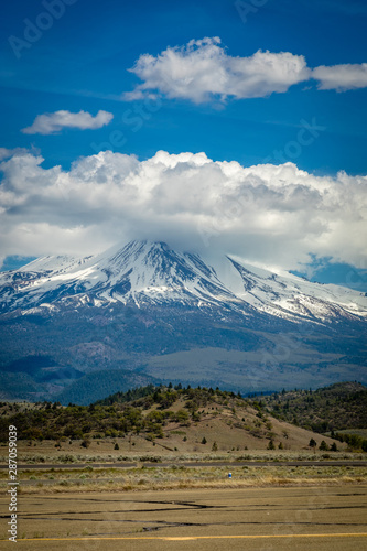 Clouds cover the tip of Mt. Shasta from Weed airport