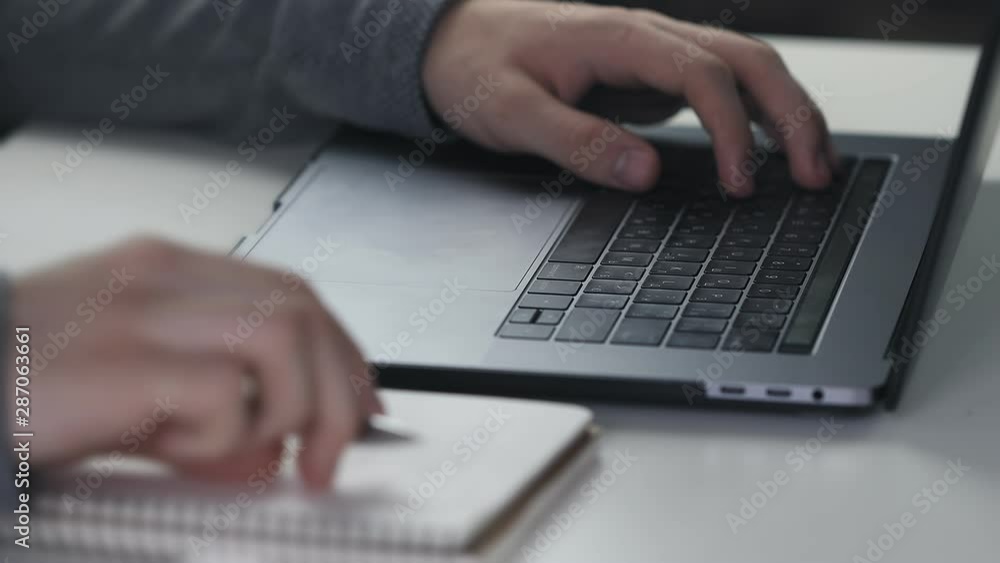 hands typing on computer keyboard, business man working on laptop pc in office hands typing on computer keyboard, business man working on laptop pc in office