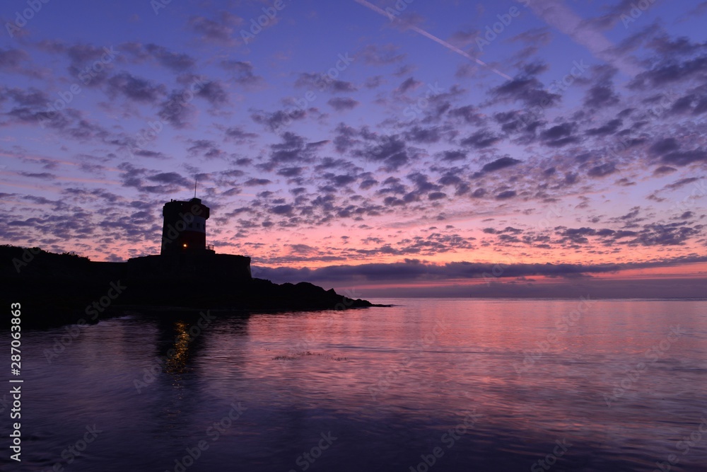Archirondel tower, Jersey, U.K. 19th century landmark at sunrise.