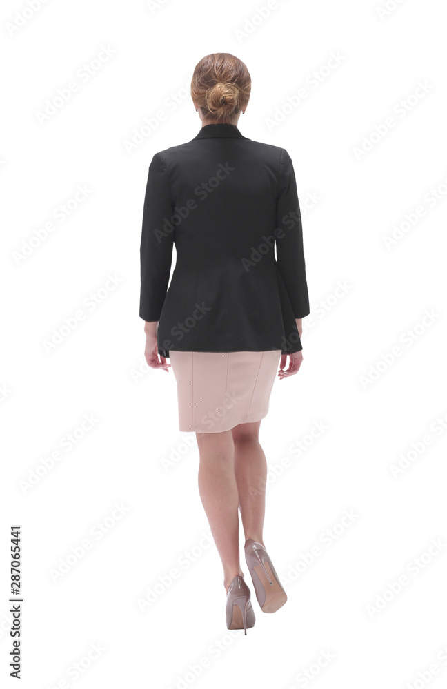 rear view . young business woman goes forward. rear view . young business woman goes forward.
