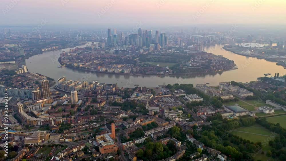 Slow dolly in shot of a beautiful, colorful sunset at Canary Wharf. Slow dolly in shot of a beautiful, colorful sunset at Canary Wharf.