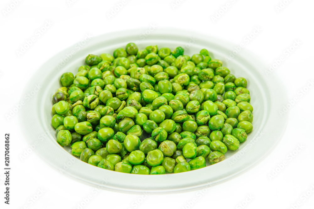 Sugar pea grains in natural pulp dish isolated on white background Sugar pea grains in natural pulp dish isolated on white background